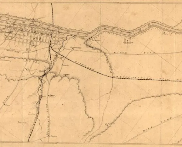 Hand-drawn manuscript map of Fredericksburg, Virginia, and the surrounding area showing landowners, roads, and terrain during the Civil War.