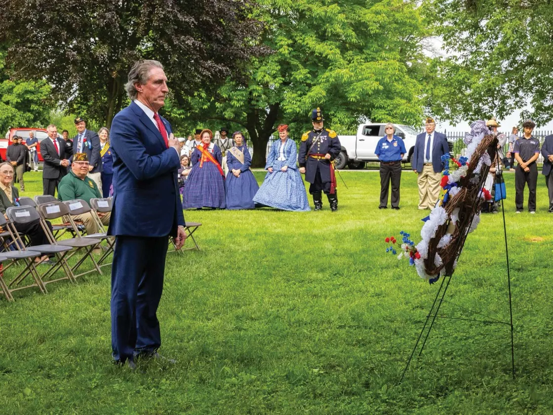 Secretary of the Interior Doug Burgum lays a wreath at the 42nd Pennsylvania Monument