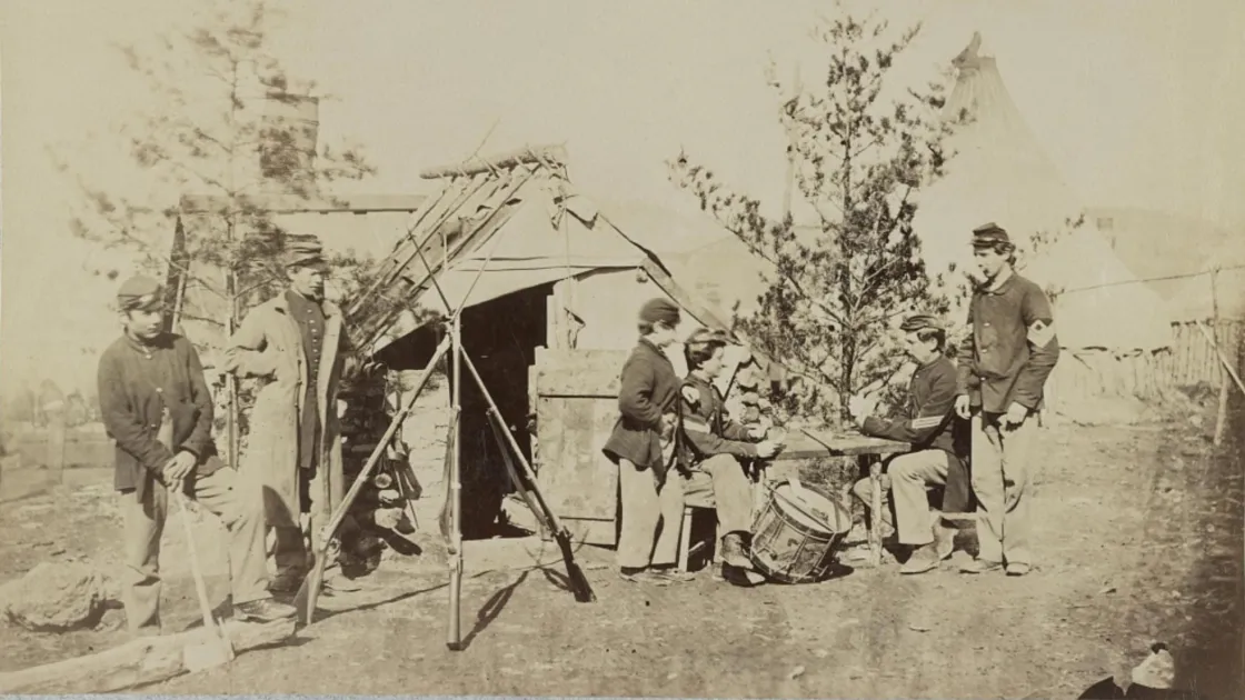 Drummer boys off duty, playing cards in camp, winter of 1862