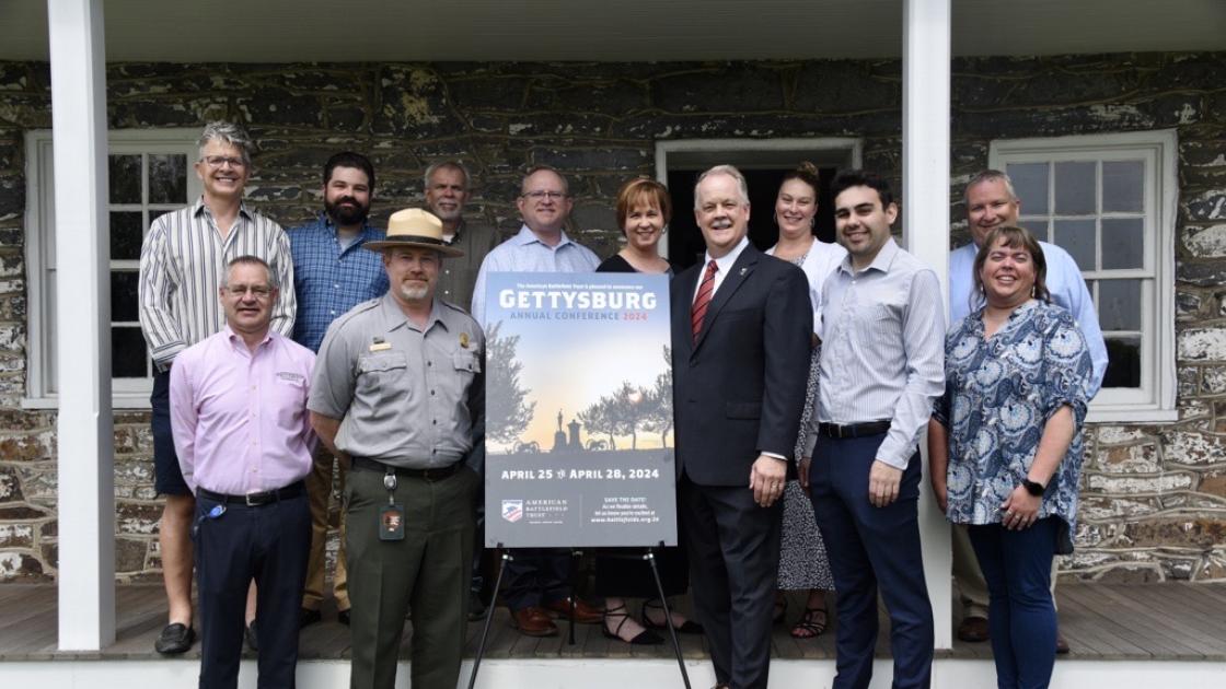 Group with poster at Lee’s Headquarters, Gettysburg