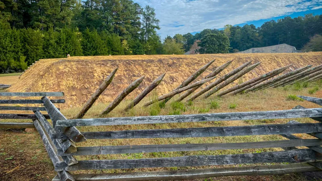 Replica trenches lined with sharpened defenses bring the brutal reality of Civil War combat into focus.