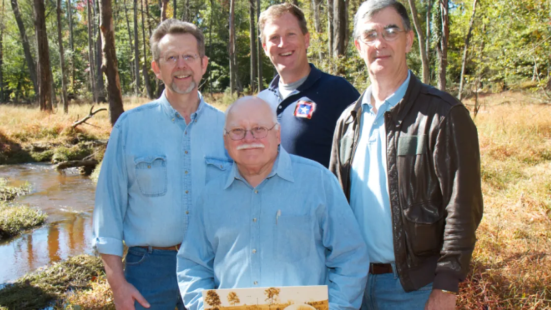 Standing beside Powhite Creek at Lowe’s Balloon Camp on the Gaines’ Mill Battlefield. From left: Dr. Jim Green, Dr. Tom Crouch (foreground), Rob Shenk, and Mike Boehme.