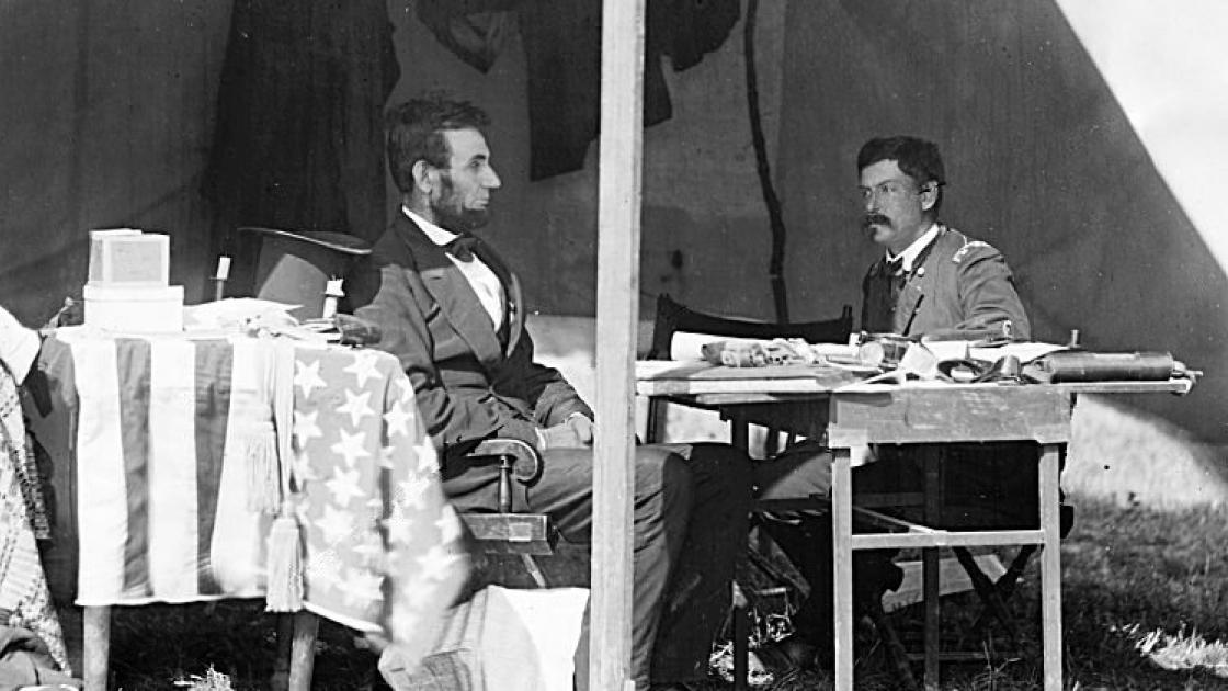 This is an image of Lincoln sitting with McClellan. 