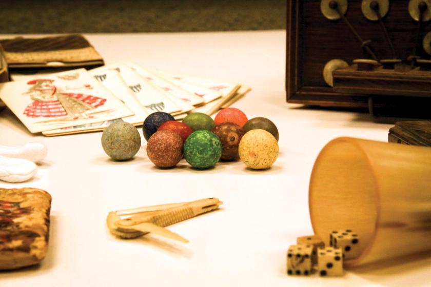 Marbles, playing cards, and dice