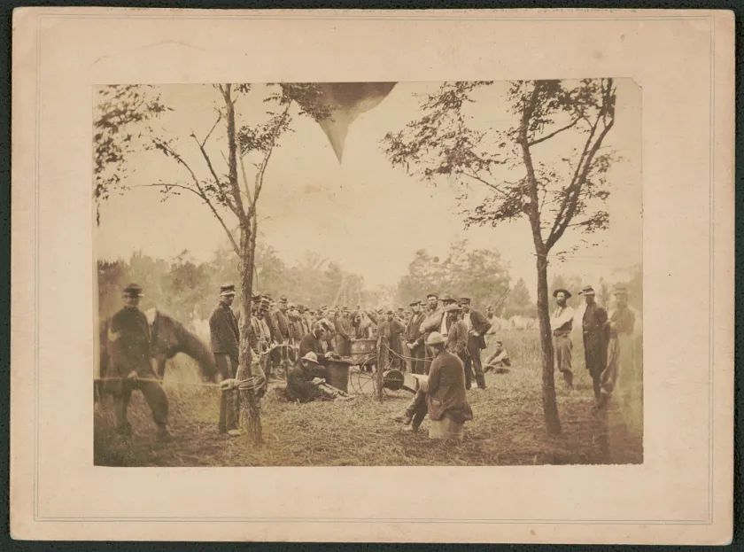 Civil War photograph showing Union soldiers gathered around the basket of a military observation balloon at Gaines' Hill near Richmond, Virginia, in June 1862.