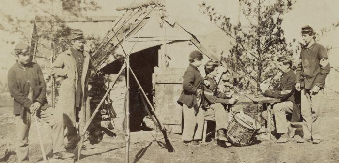 Drummer boys off duty, playing cards in camp, winter of 1862