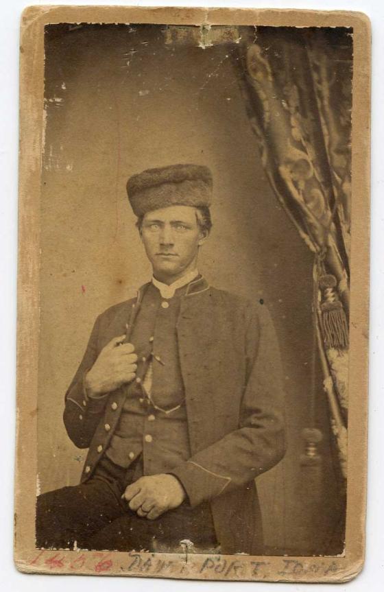 A carte-de-visite of a young man with a mark indicating it was taken in Davenport, Iowa