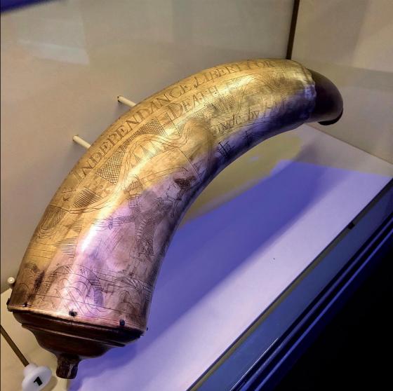Engraved powder horn with the words '& Independence Liberty or Death' visible