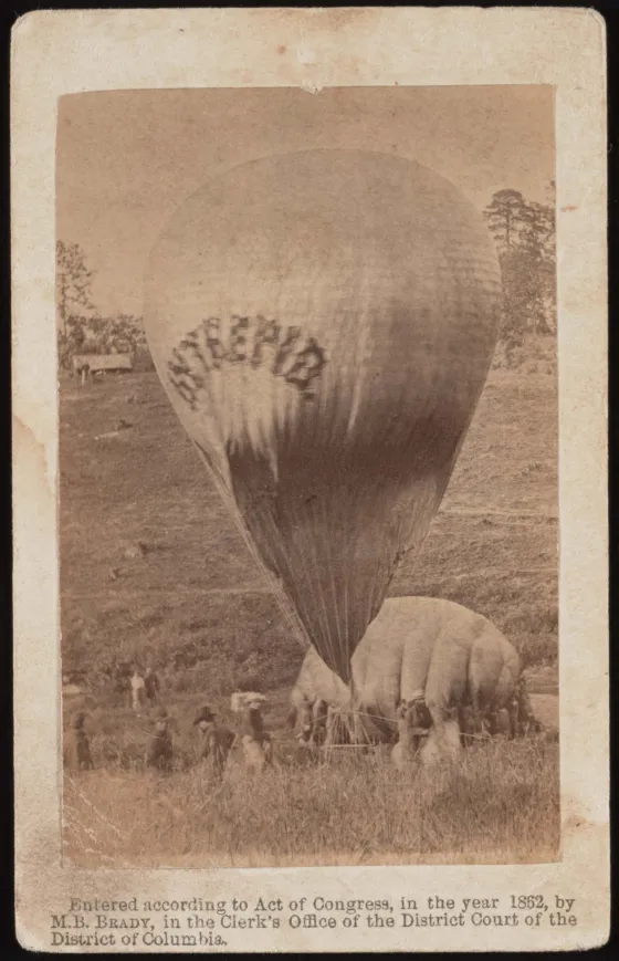 Civil War photograph showing the Union Army observation balloon Intrepid being inflated using gas transferred from the balloon Constitution at Fair Oaks, Virginia, in 1862.