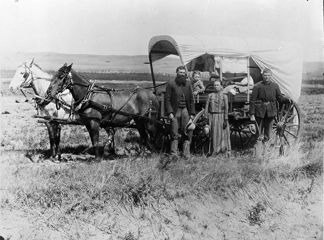 A Pioneer Family with Their Covered Wagon near Loup Valley, Nebraska, 1886 