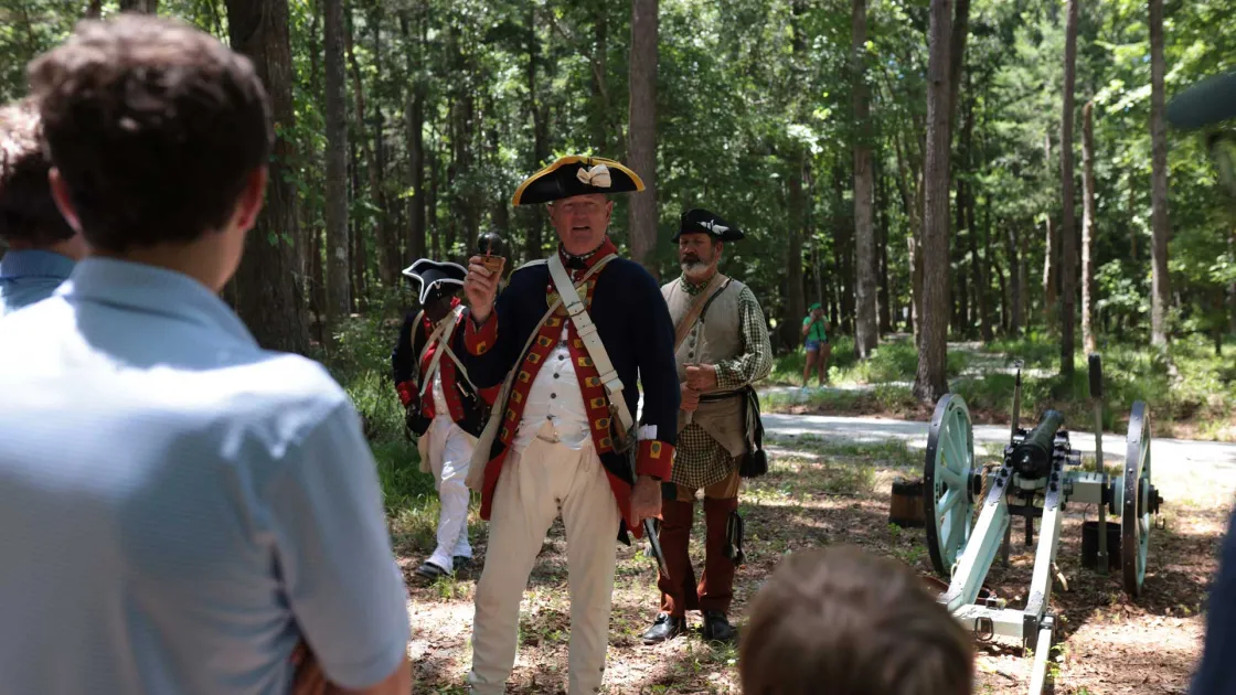 Reenactor prepares a live demonstration for tourists on the Liberty Trail South Carolina
