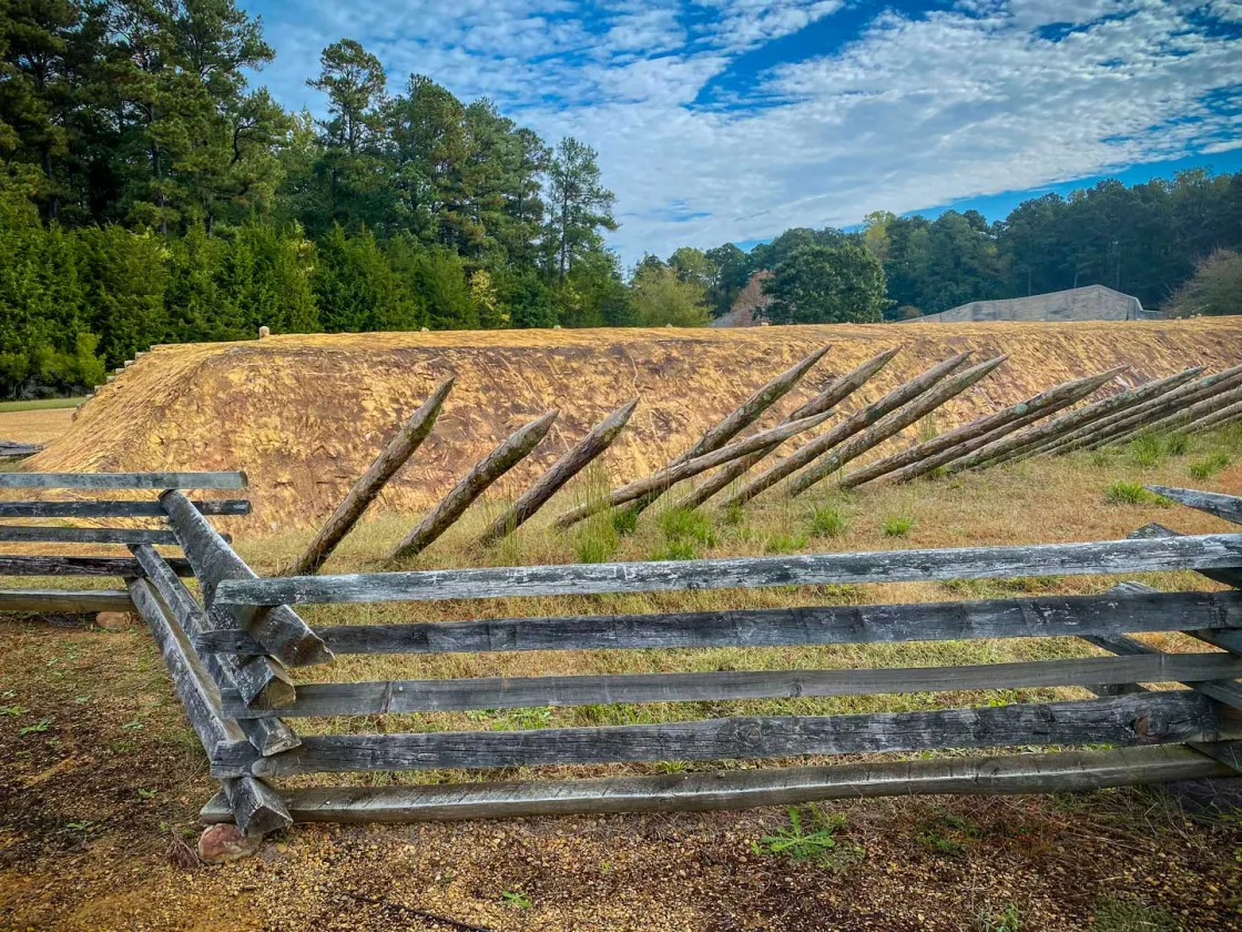 Replica trenches lined with sharpened defenses bring the brutal reality of Civil War combat into focus.