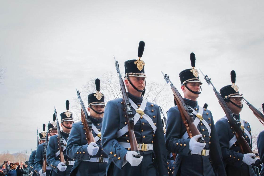 West Point cadets marching in uniform formation with rifles