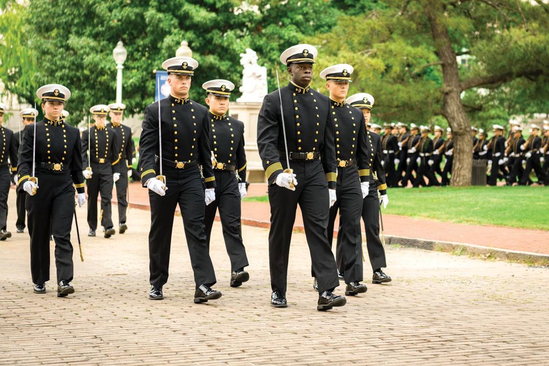 Fornal paradę formation on the grounds of the Navy Academy with a brick path