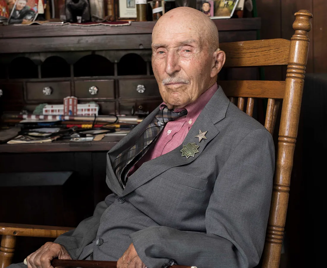 Ed Bearss seated