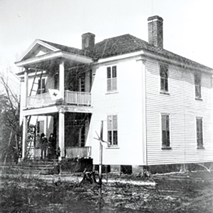 A black-and-white 1895 photograph of Harper House