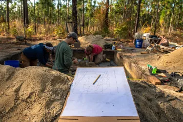 The team works carefully to excavate remains at Camden Battlefield.