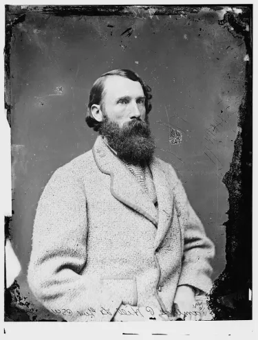 Portrait photograph of Confederate Lt. Gen. A.P. Hill, shown from the chest up in a dark coat and vest.