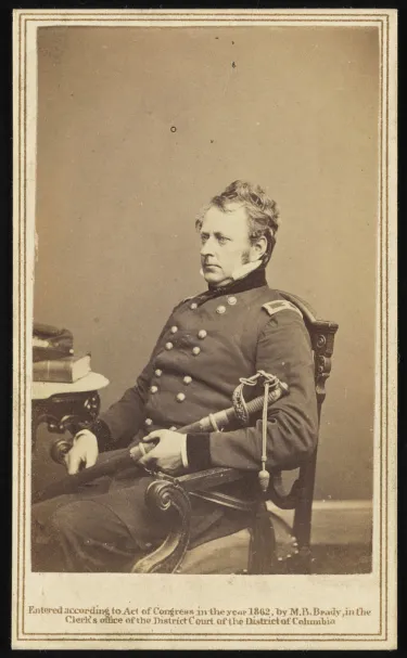 A photograph of Major General Joseph Hooker of in uniform with sword