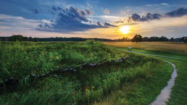 Photograph of a sunset over the Yorktown battlefield