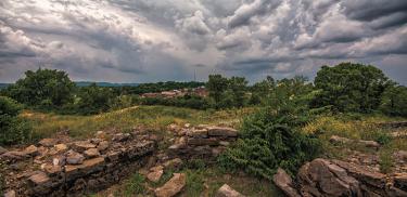 This is a photograph of the Nashville Ruins on a cloudy day. 